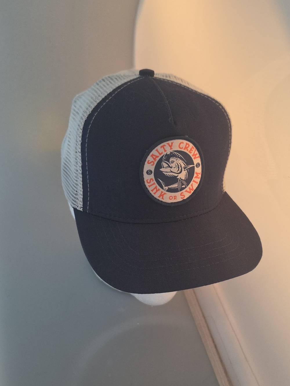 Salty Crew Navy, White & Orange Trucker Hat with Fish Patch